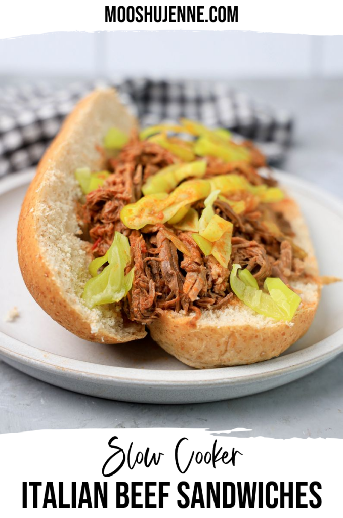 Slow cooker Italian beef sandwiches made from tender slow cooked beef bottom roast in beef broth with crushed tomatoes and pepperoncini’s. Delicious beef sandwich with a spicy au jus sauce for dipping or topping.