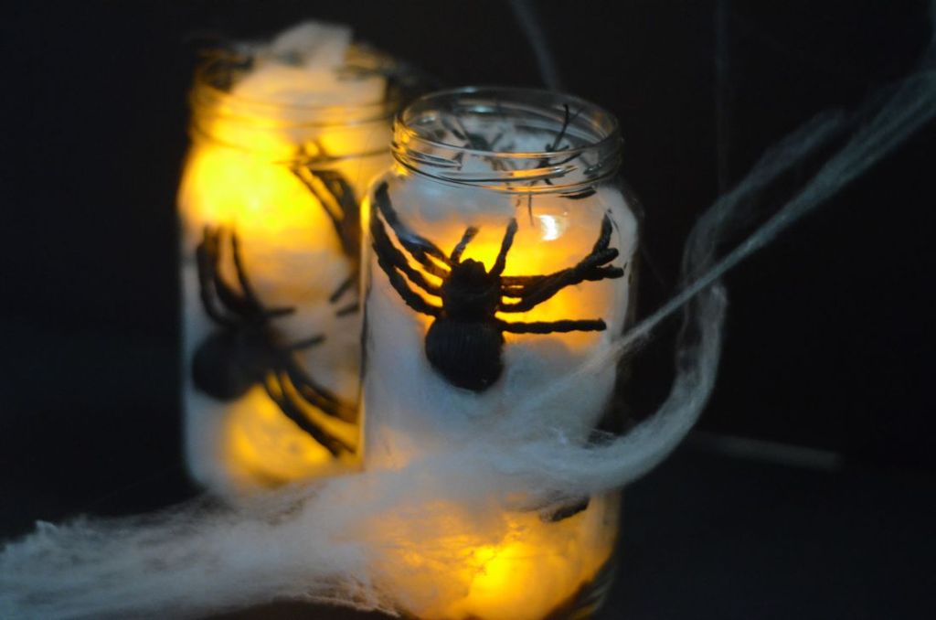 Creepy Crawler Spider Jars by Mooshu Jenne - Spider web, fake spiders, and battery operated tea light candles.