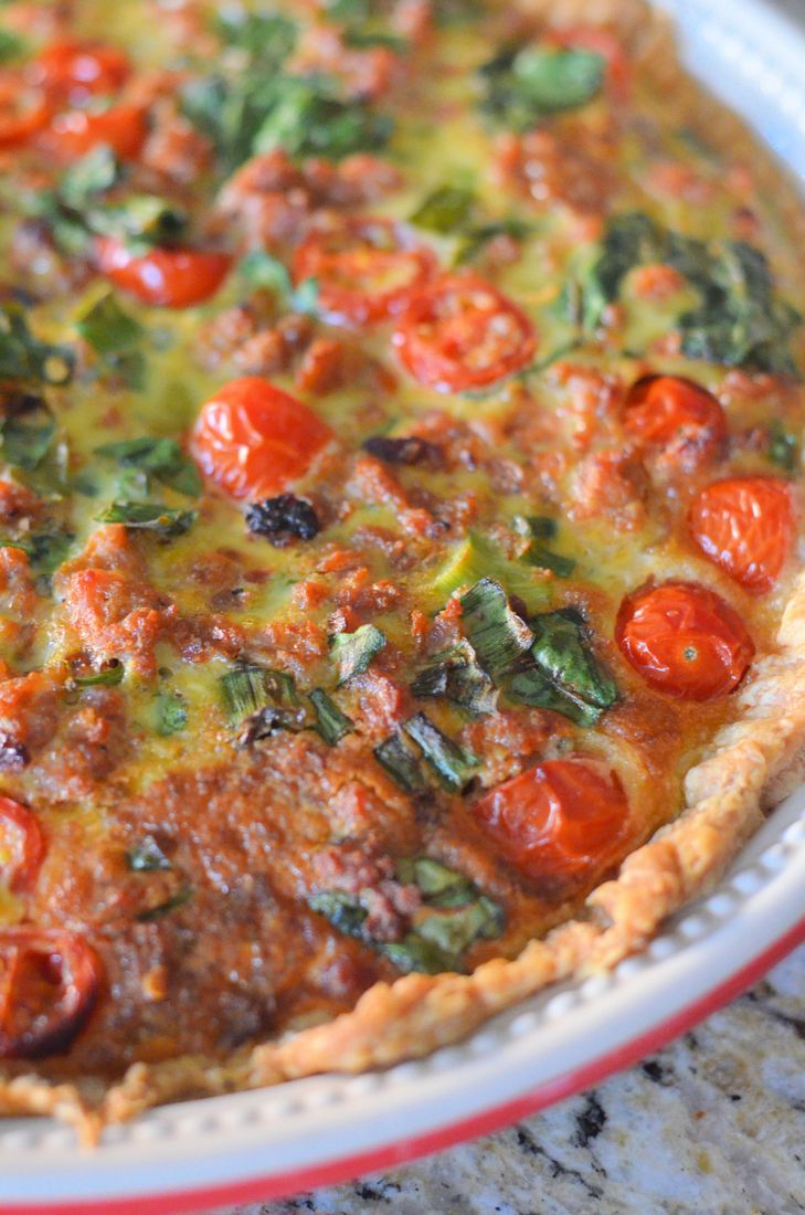 Italian Sausage Tart with spinach, spring onions, tomatoes, egg, and sausage.