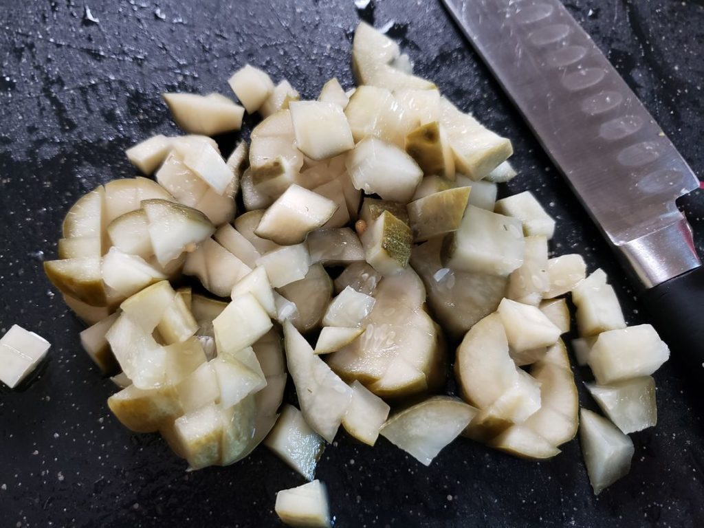 Pickles on a cutting board