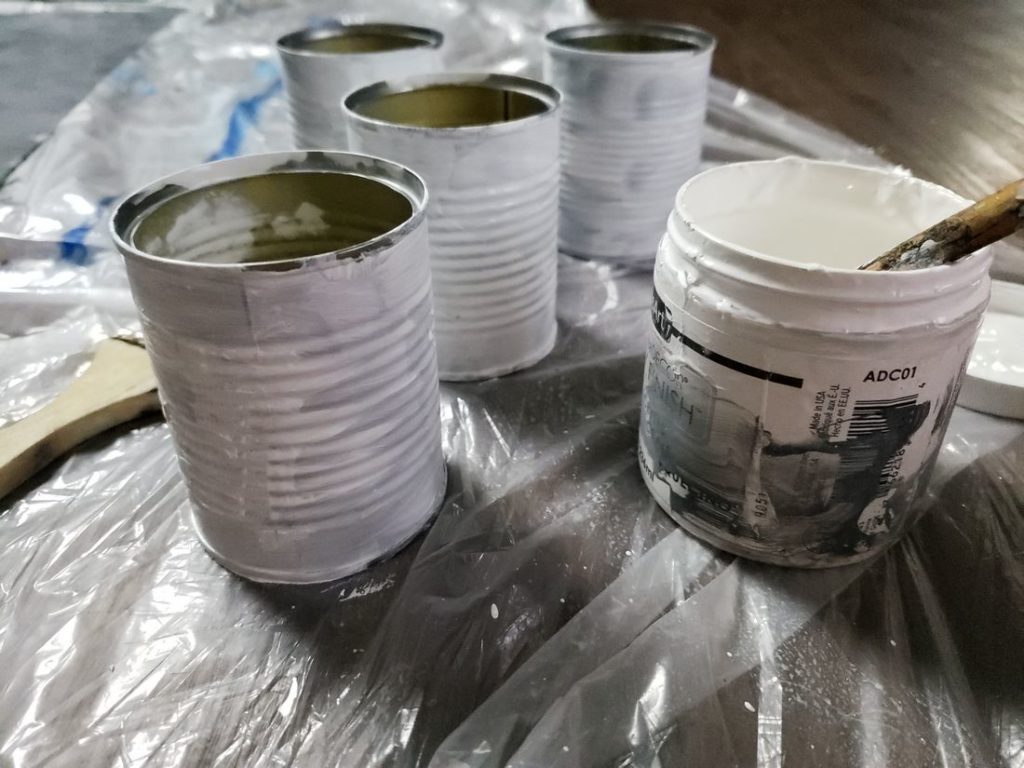 One coat of paint on tin planters