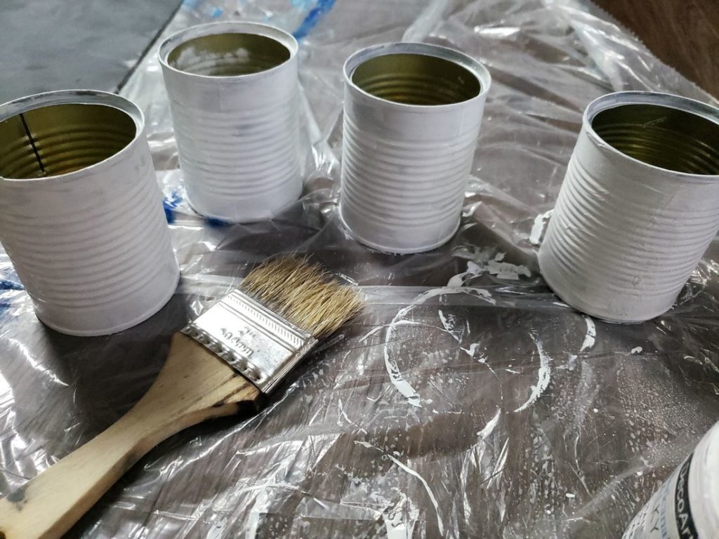 Farmhouse Tin Planters being painted
