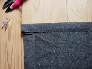 Sewing the napkin in gray