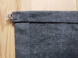 Sewing the napkin in gray