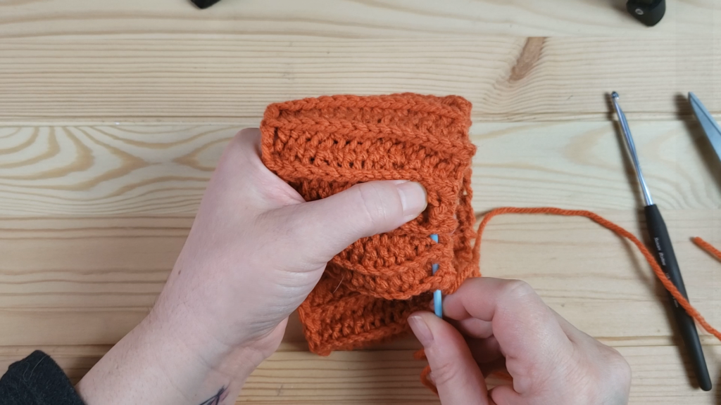 Sealing the pumpkin shut with hand stitching