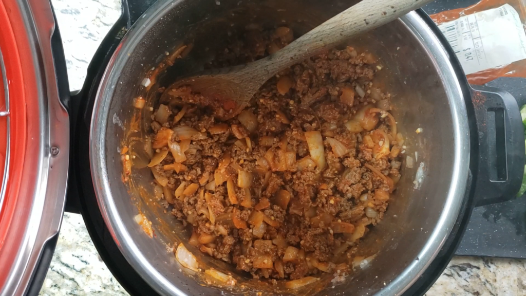 Ground beef with onion and paprika inside the instant pot