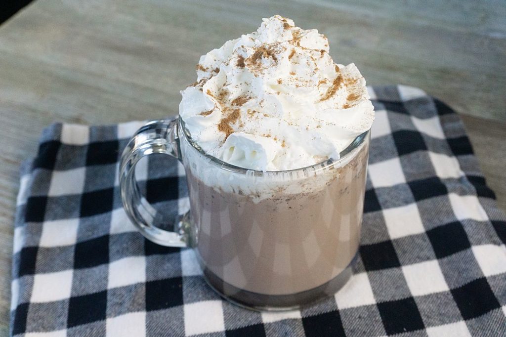 Instant Pot Double Hot Chocolate on Grey wood with black and white plaid napkin