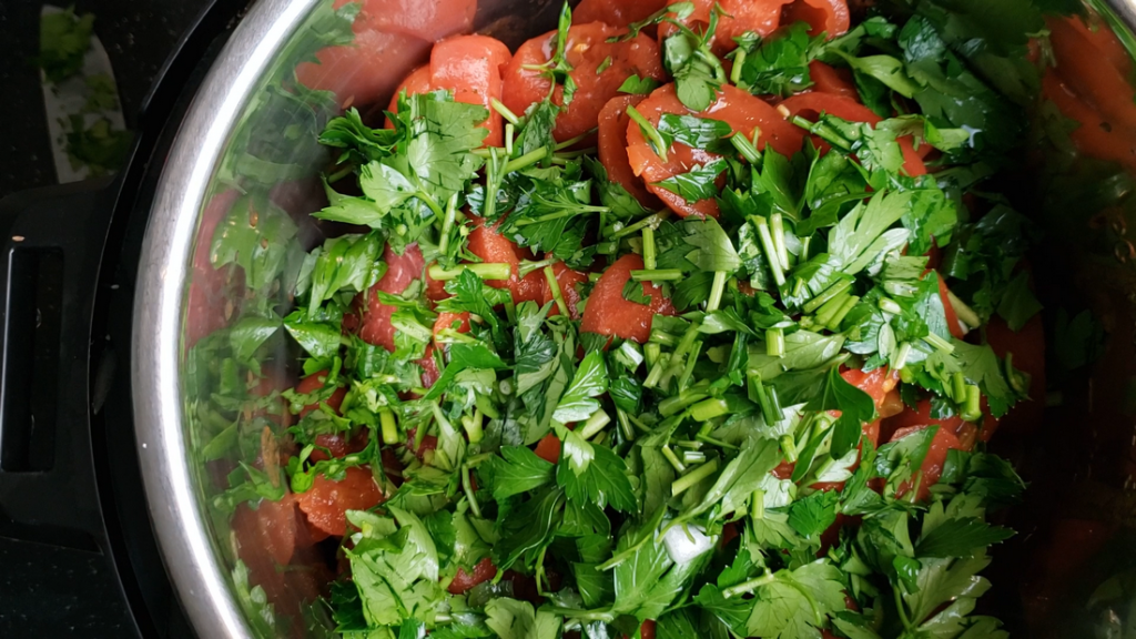 tomatoes and parsley inside the instant pot