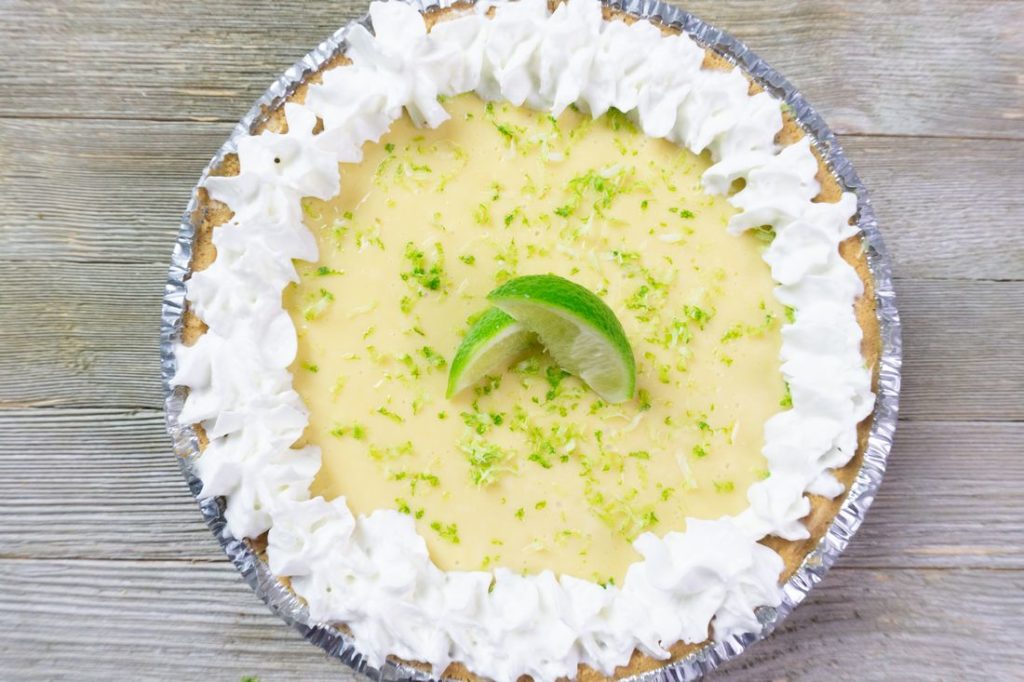 Key West Key Lime Pie on grey wood background