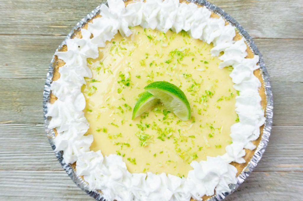 Key West Key Lime Pie on grey wood backdrop