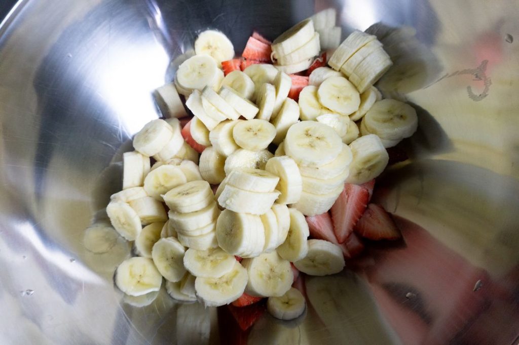 Bananas and Strawberries in a large metal bowl