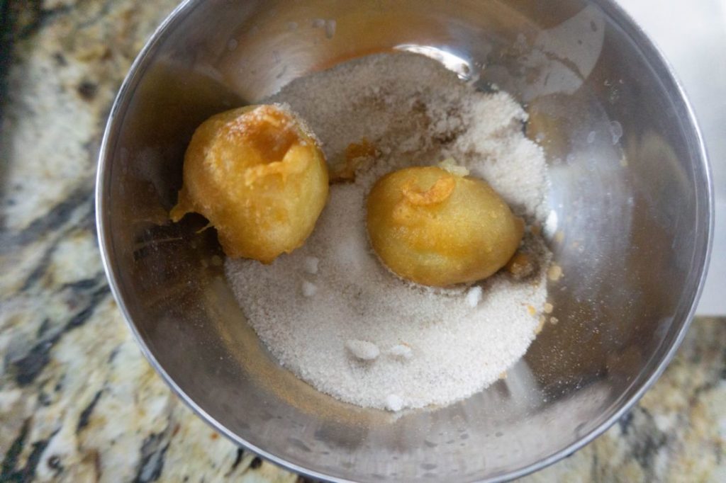 Cinnamon sugar mixture with deep fried bananas 