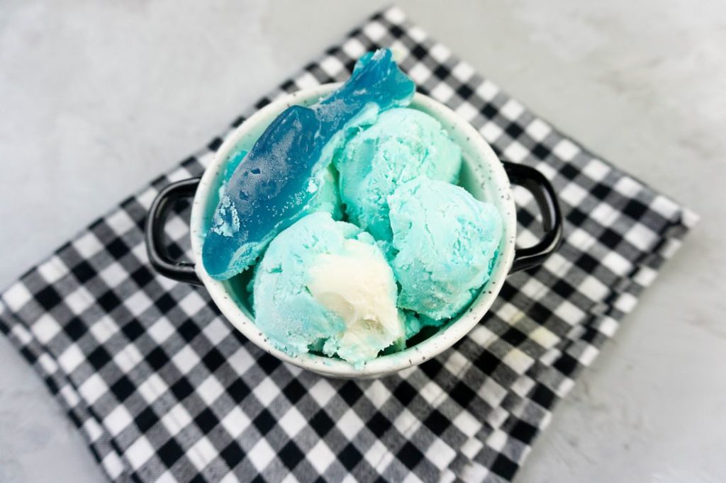 Blue Shark Ice Cream on concrete board with plaid napkin