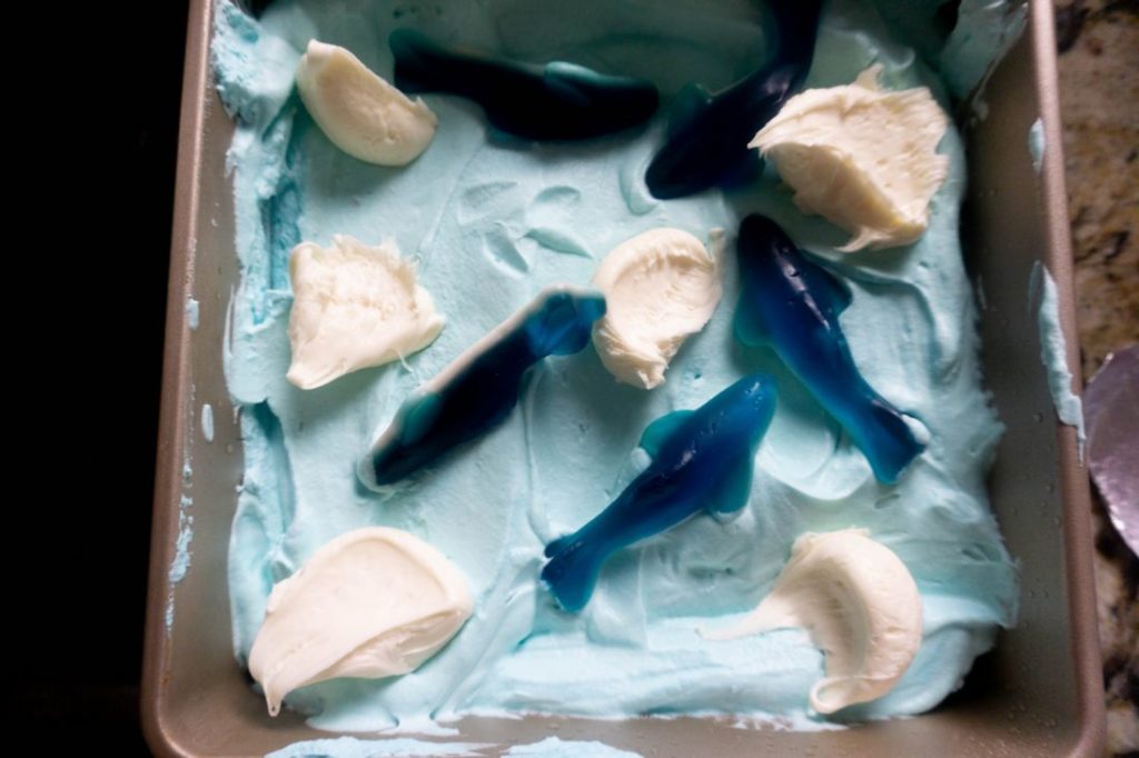 Shark ice cream in a 9x9 pan with shark gummies