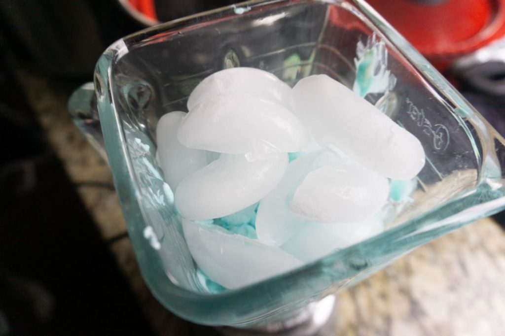 Ice and shark ice cream in a blender