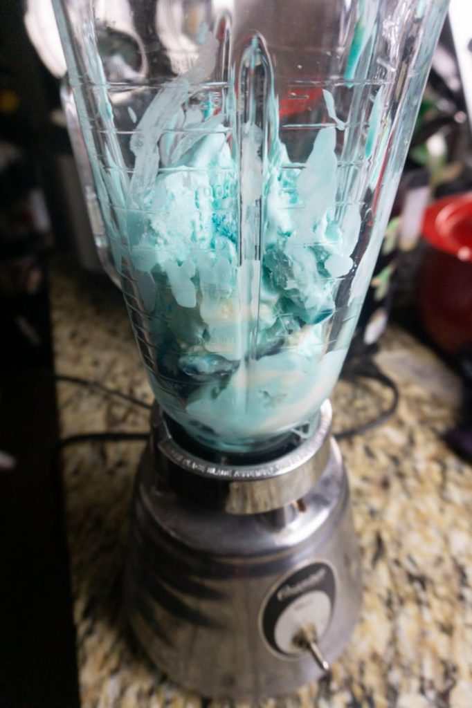 Ice and shark ice cream in a blender
