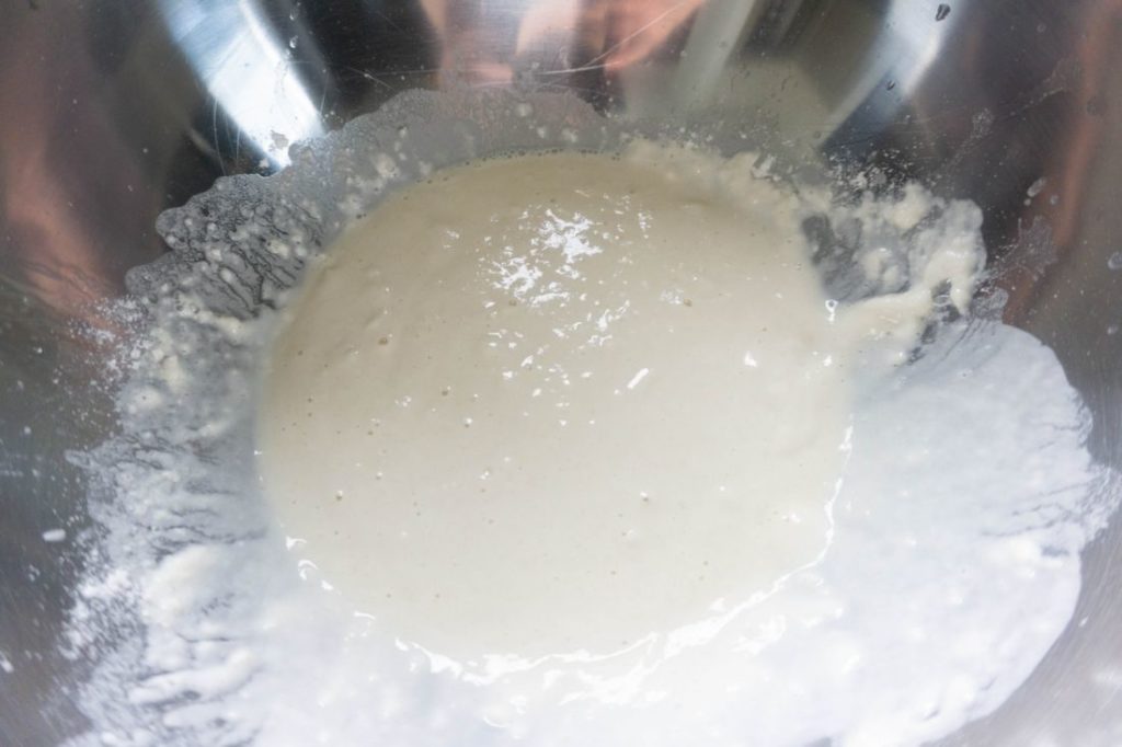 Batter in a stainless steel bowl