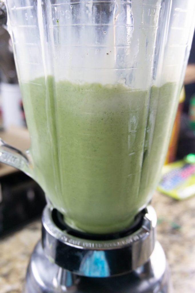 Green frappuccino ice cream mix in blender