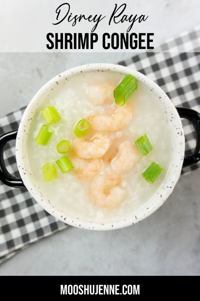 Disney Raya Shrimp Congee in a white bowl with plaid gray napkin on a concrete backdrop