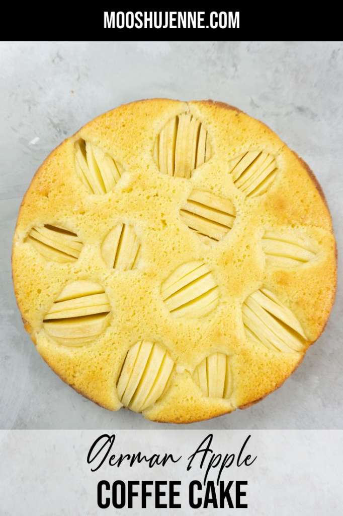 German Apple Coffee Cake with sliced apples on a concrete gray back drop