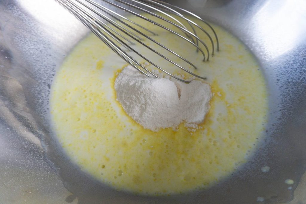 Whisking instant vanilla jello pudding mix