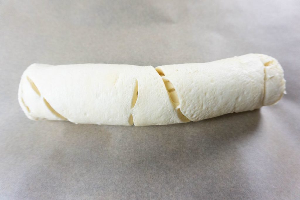 Roll of croissant dough
