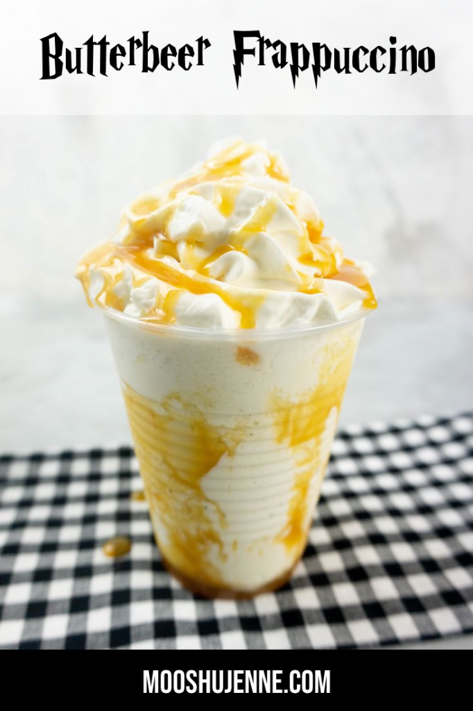 Butterbeer Frappuccino on a gray plaid napkin on a concrete backdrop