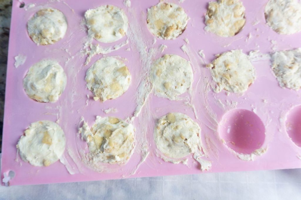 Golden oreos and cream cheese mixture in a mold