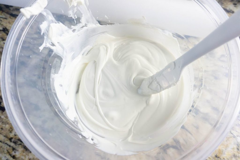 White candy melts in a bowl melted for dipping