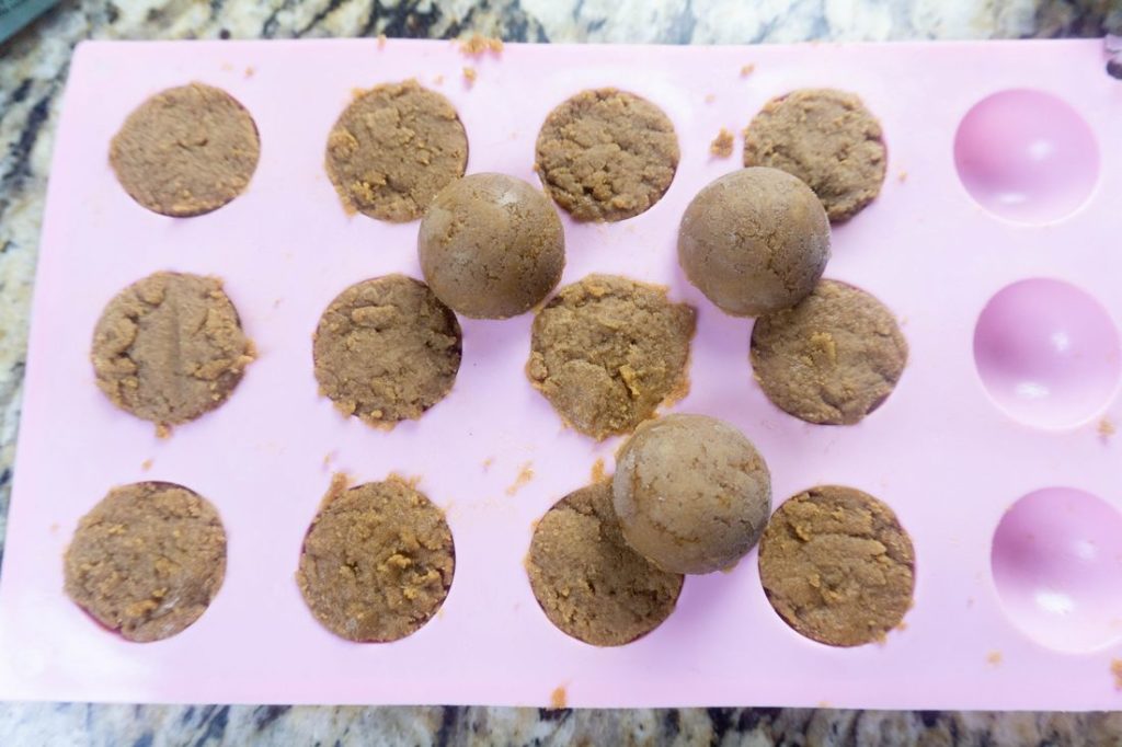 peanut butter and brown sugar dough in the small dome mold