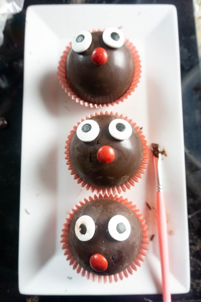 Rudolph hot chocolate bombs getting eyes and noses.