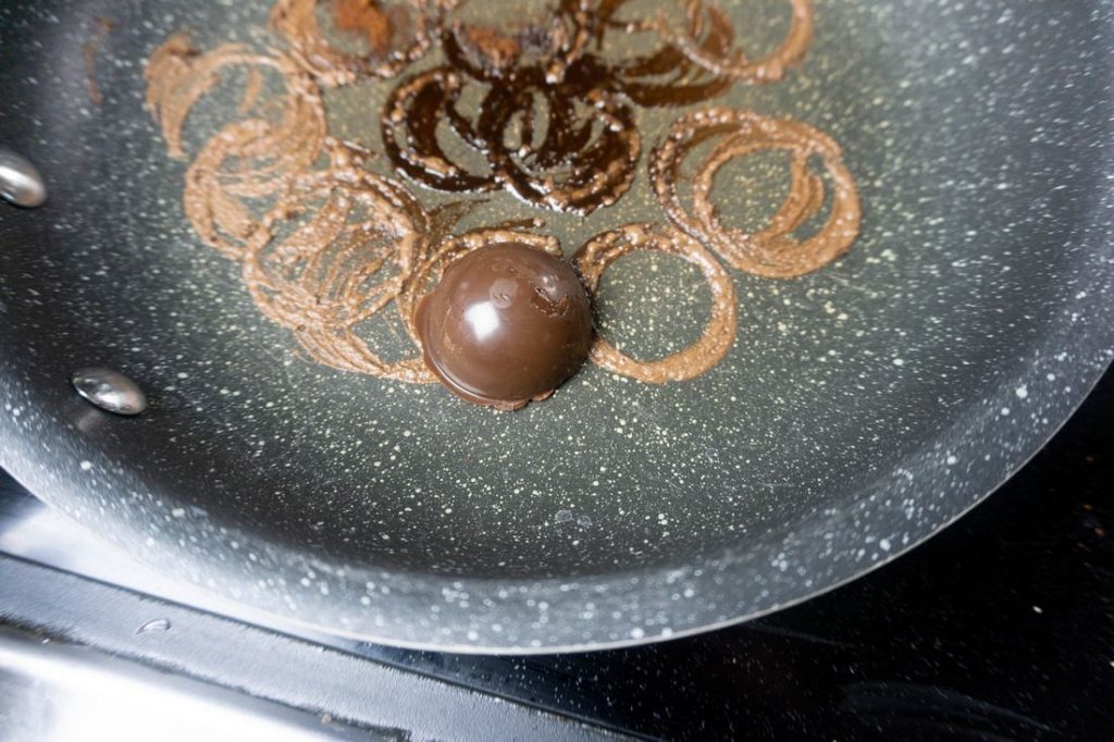 Melting a small dome in a sauce pan.