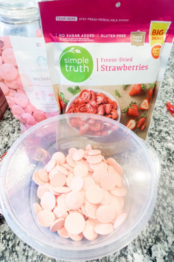 Pink candy melts and dried strawberries