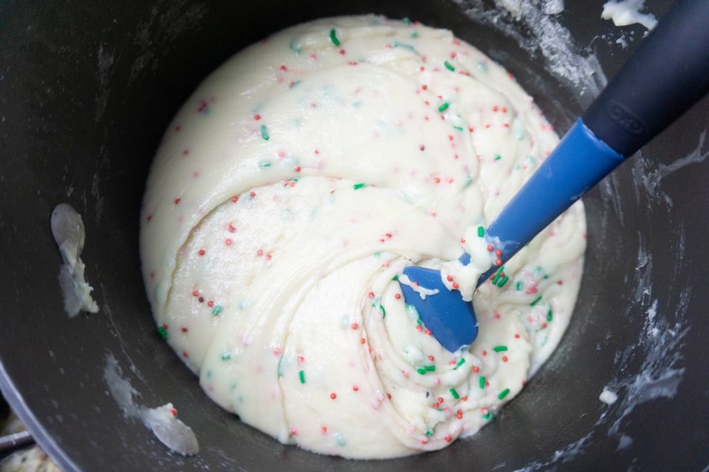 Melted white chocolate chips with sweetened condensed milk and sugar cookie mix.