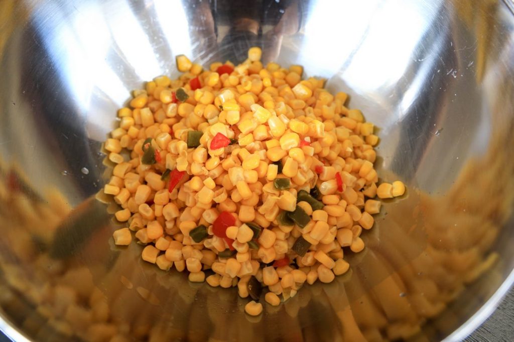 southwestern corn in a metal bowl