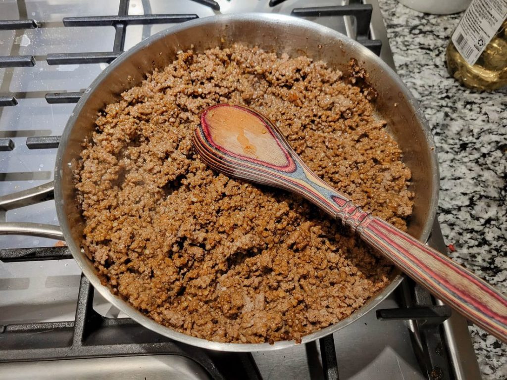 seasoned ground beef in frying pan