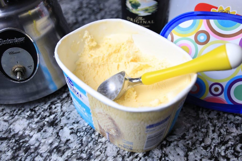 Vanilla ice cream being scooped