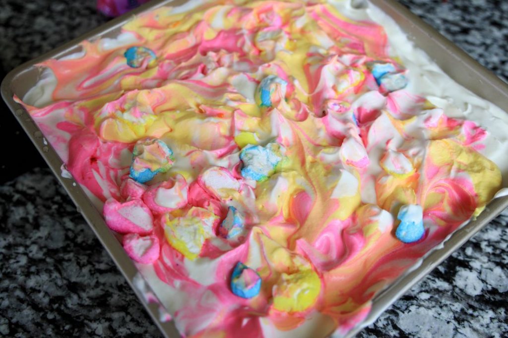 Yellow and pink swirled in with peeps into the white ice cream