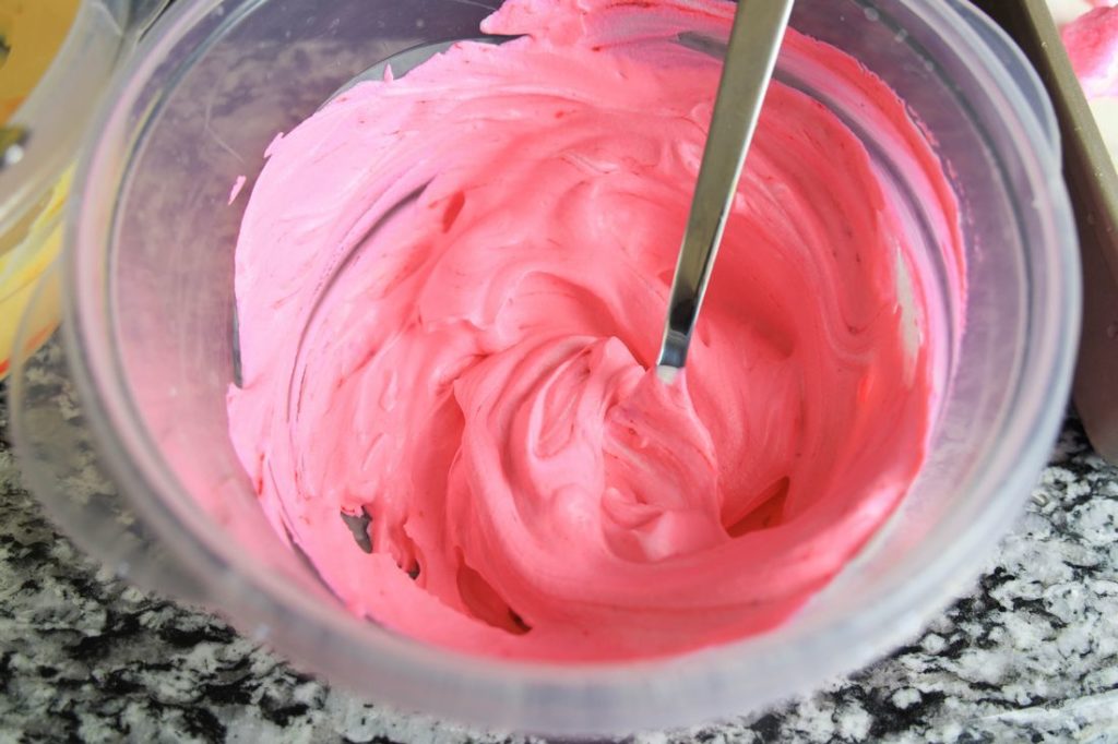 Ice cream mixture dyed pink.