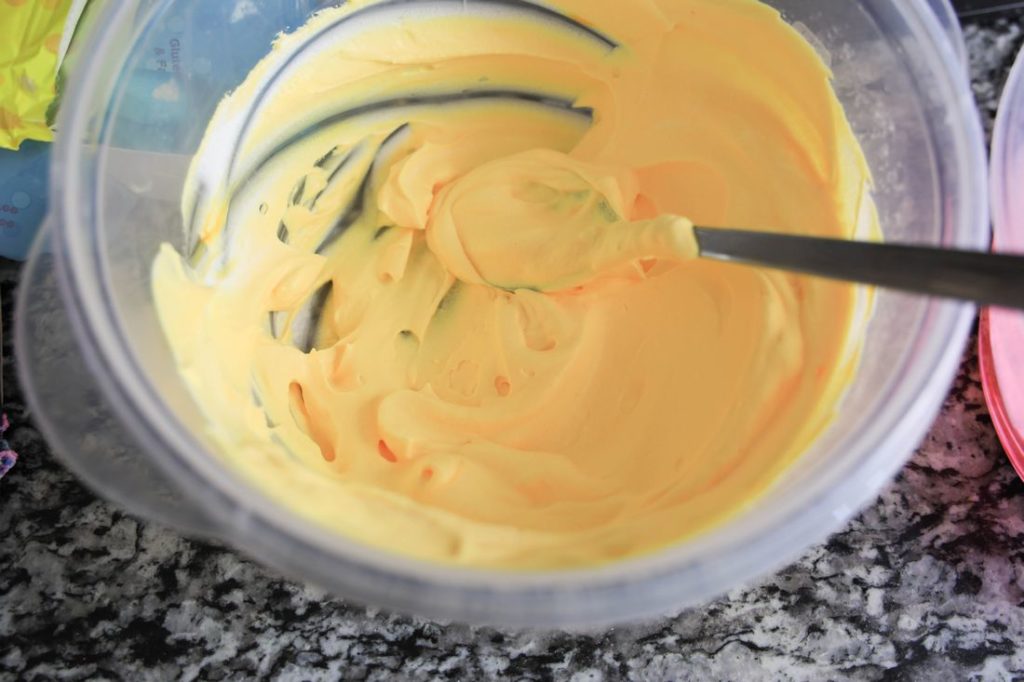 Ice cream mixture dyed yellow.