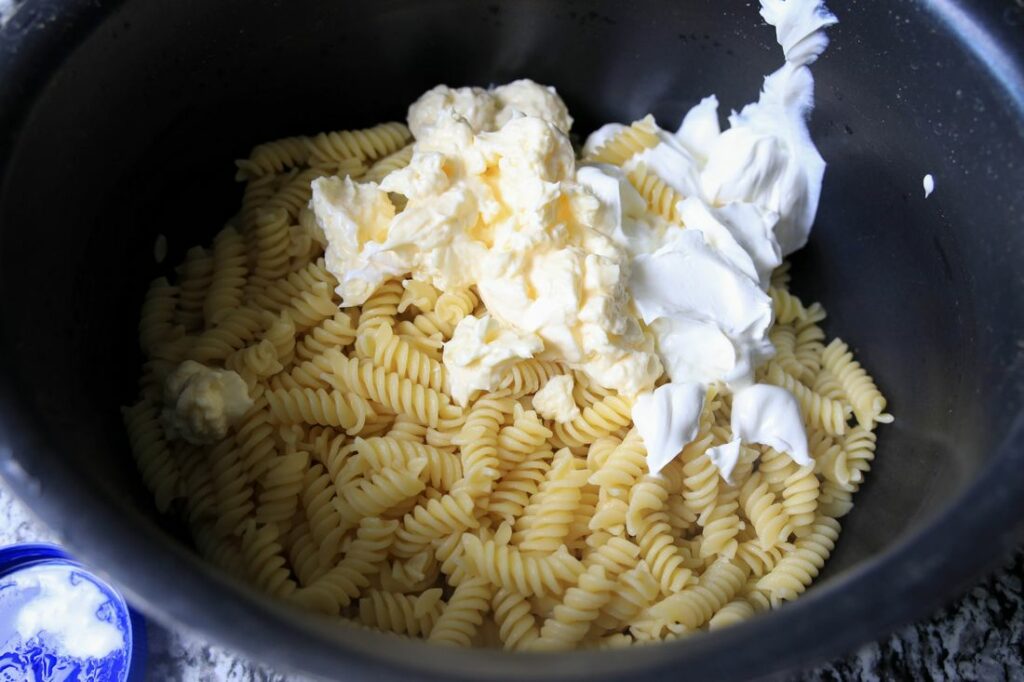 Pasta, Mayo, and sour cream in a pasta pot