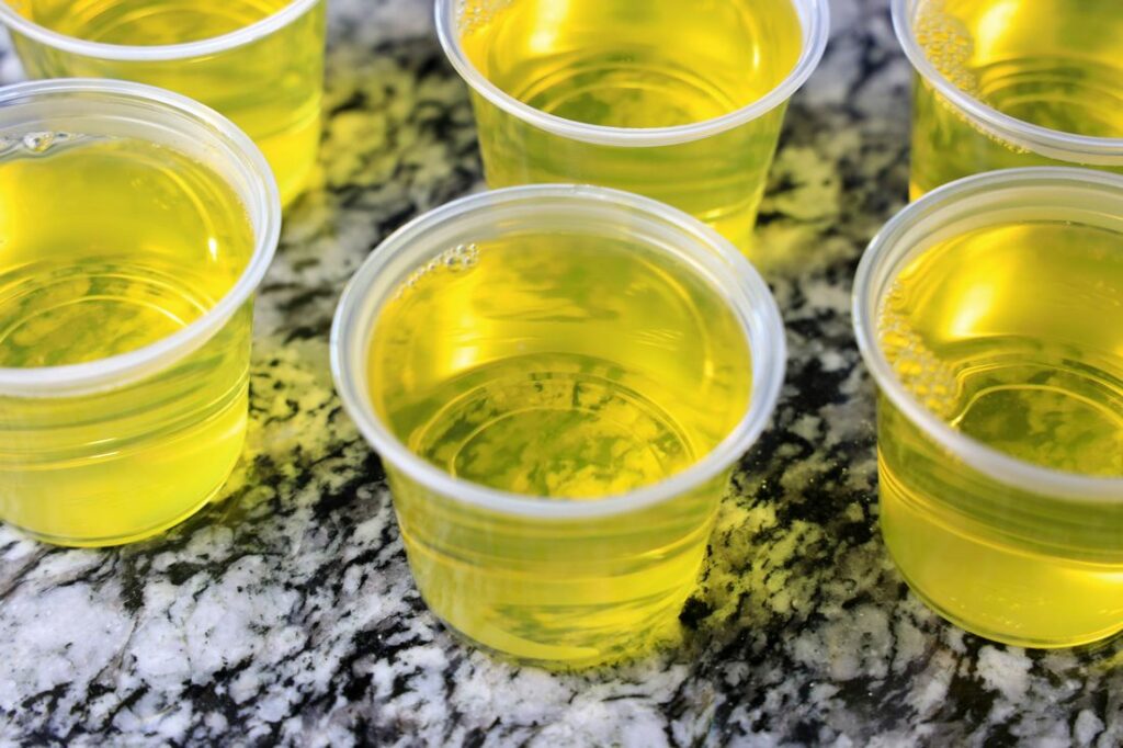 Pineapple jello mix in the jello cups