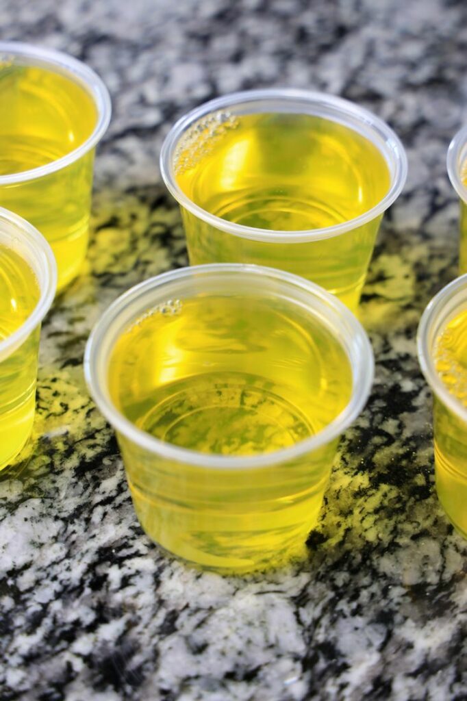 Pineapple jello mix in the jello cups