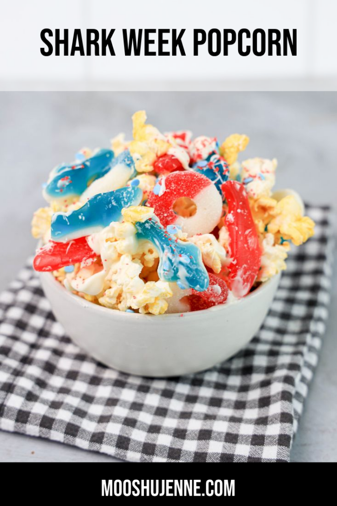 Shark week is coming this July. I just love Shark Week and what better to have while watching is Shark Week Popcorn. Made with blue gummy sharks, Swedish fish, gummy rings, and drizzled with Ghirardelli's white chocolate.