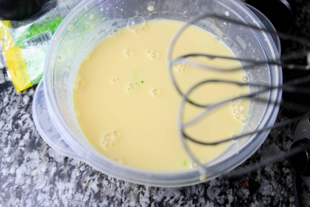 Pudding mix in a plastic bowl.