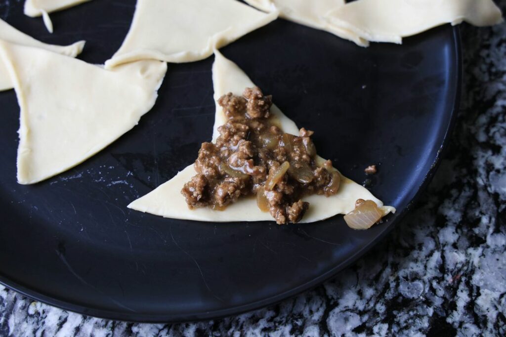 Witch Hats filled with ground beef gravy mixture.