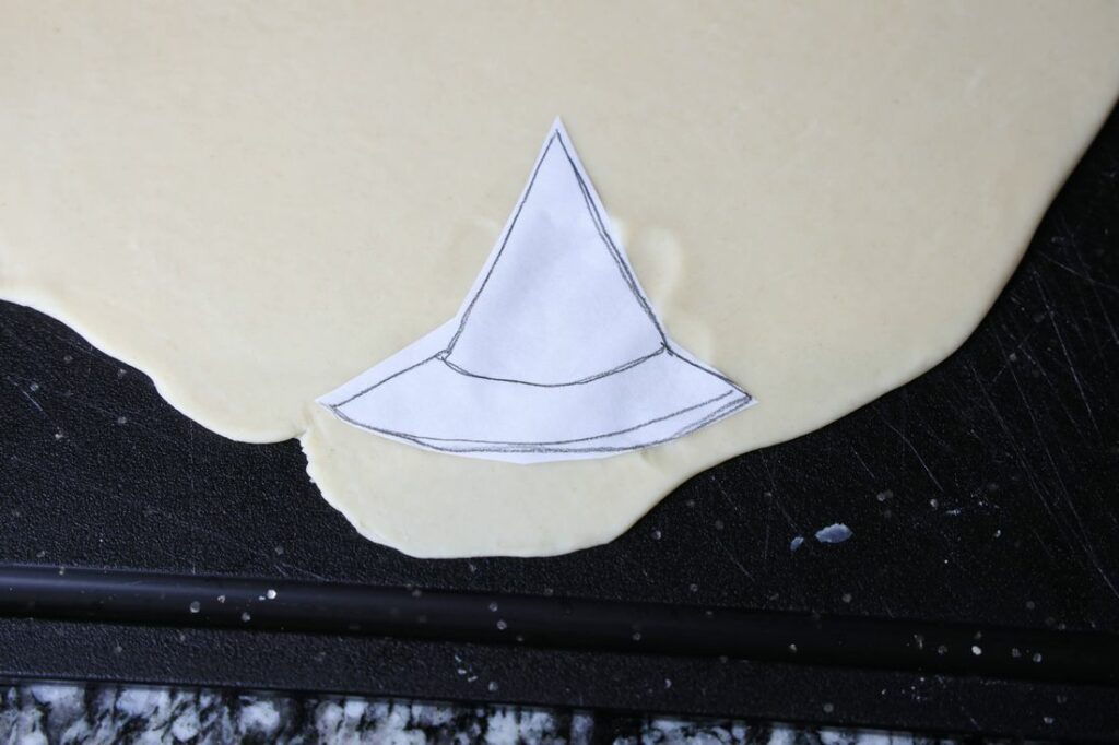 Witch hat cut out on pie dough