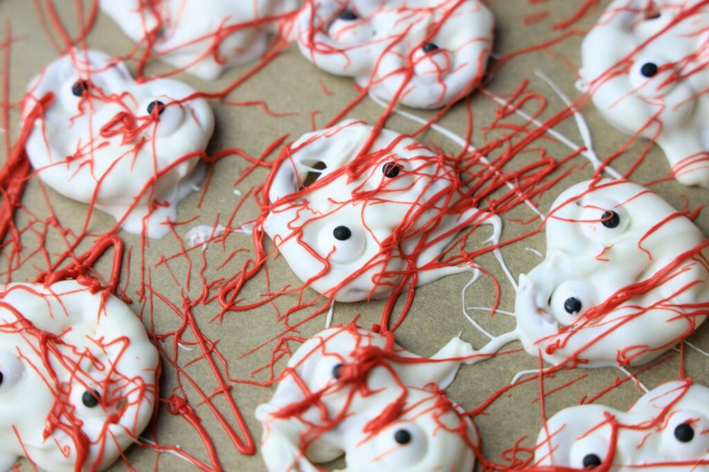 Chocolate covered pretzels with blood splatter.