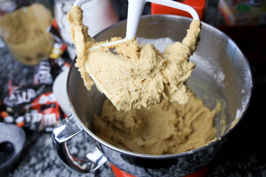 Peanut butter cookie mixture in the kitchenaid mixer.