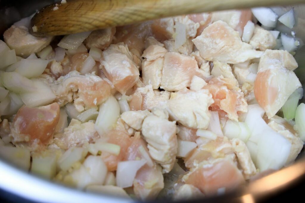 Chicken being cooked in the instant pot.